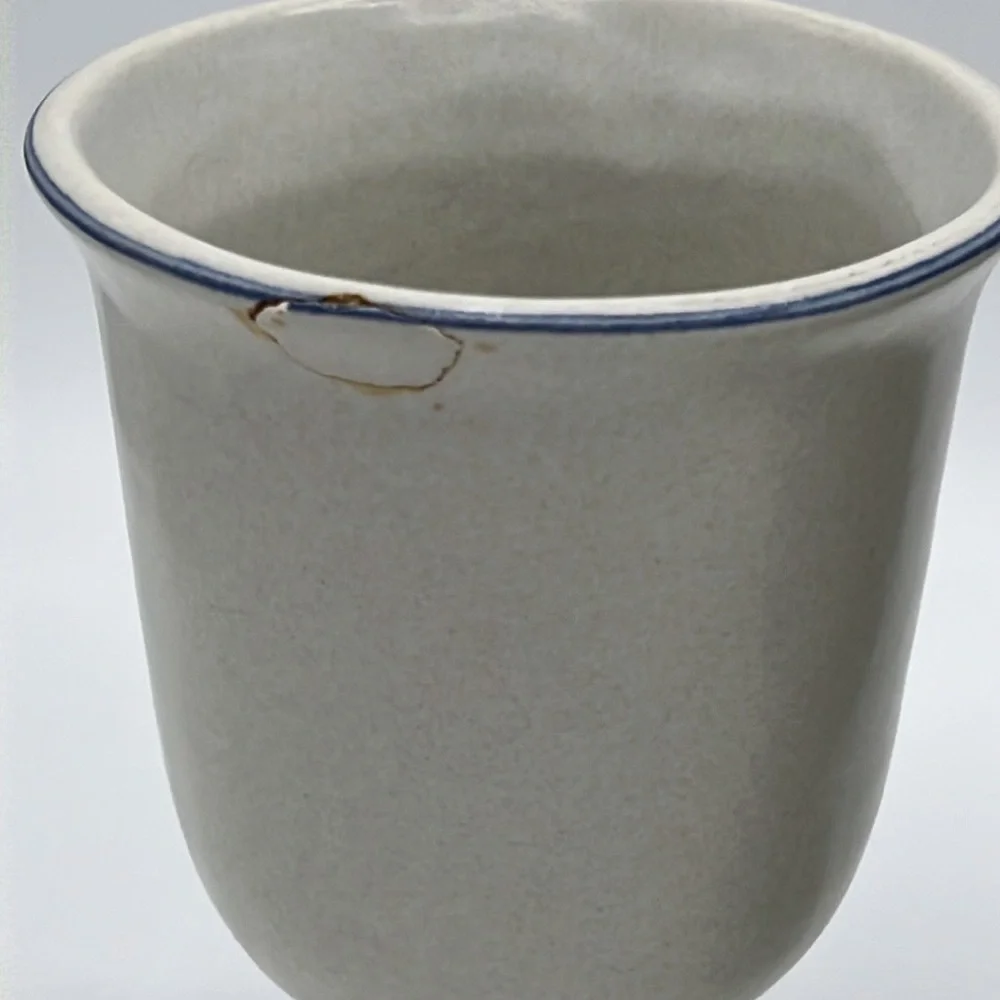 CREAM AND BLUE STONEWEAR DRINKING MUGS AND PITCHER